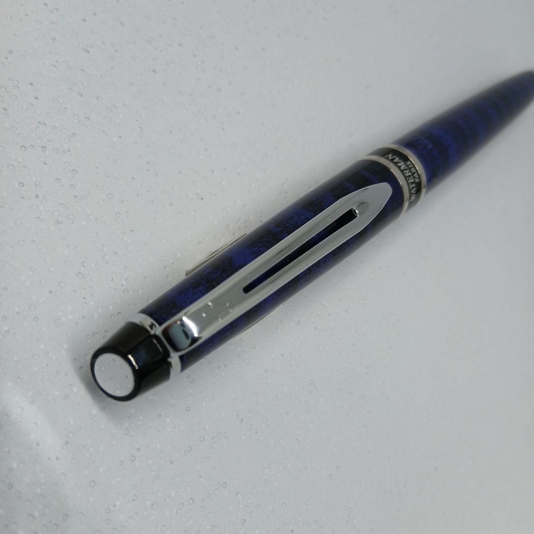 WATERMAN Expert Blue Marble ballpoint pen in blue metal with stripe pattern shown with box and manual