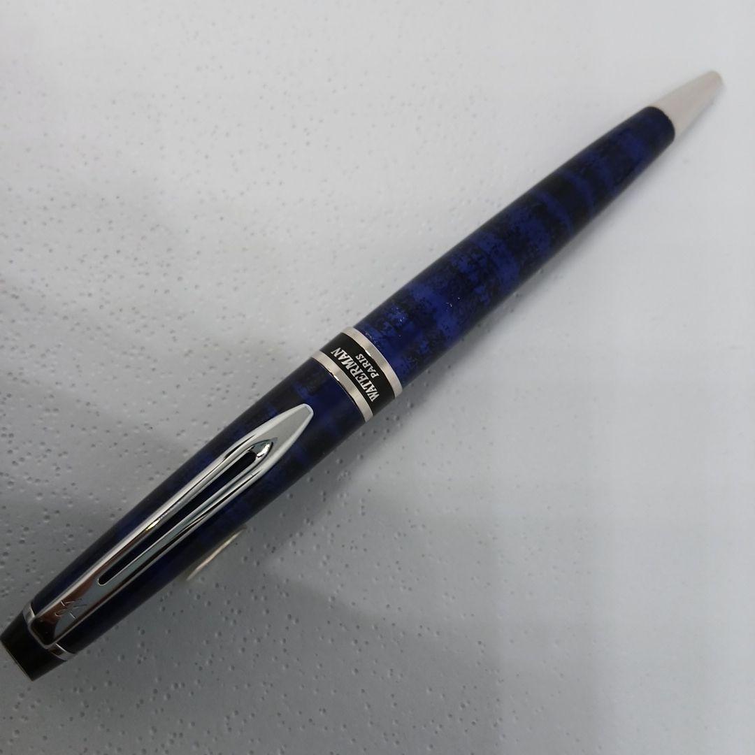 WATERMAN Expert Blue Marble ballpoint pen in blue metal with stripe pattern shown with box and manual