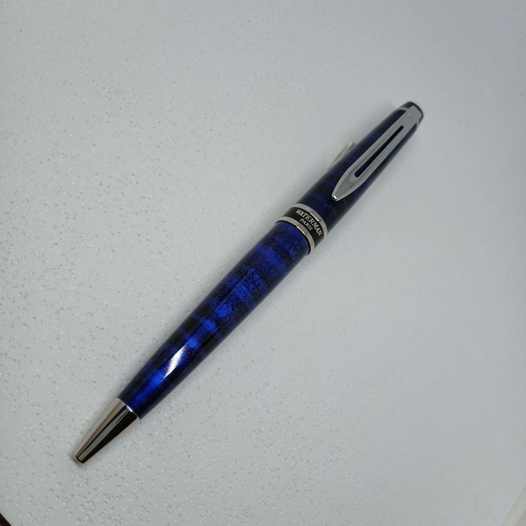 WATERMAN Expert Blue Marble ballpoint pen in blue metal with stripe pattern shown with box and manual