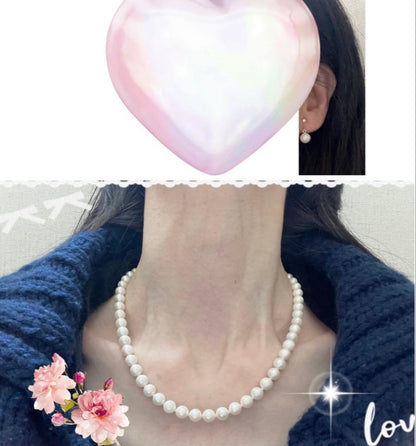 High-quality Akoya pearl necklace and earring set with 7.5mm white round pearls on a white background