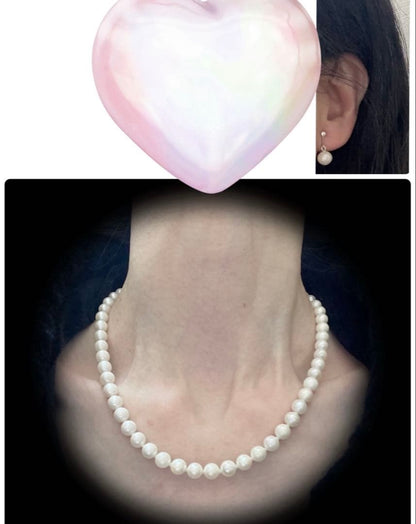 High-quality Akoya pearl necklace and earring set with 7.5mm white round pearls on a white background
