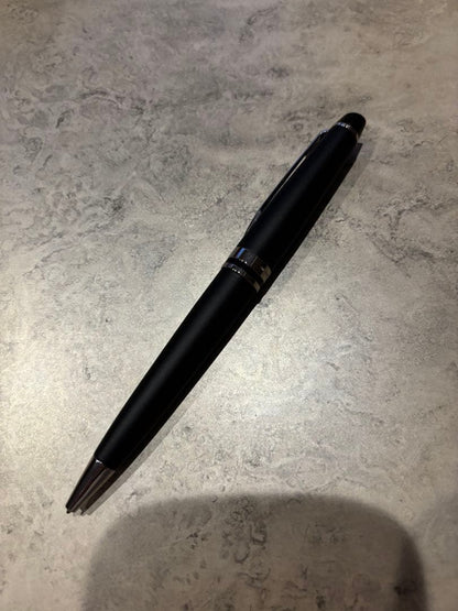 Black WATERMAN ballpoint pen with sleek design and silver clip on white background