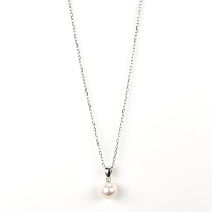 Newly restored Mikimoto white gold necklace with 7.5mm Akoya pearls and 13.4mm pendant