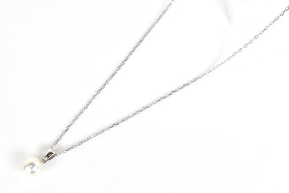 Newly restored Mikimoto white gold necklace with 7.5mm Akoya pearls and 13.4mm pendant
