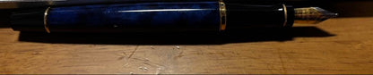 Waterman Expert Marble Blue fountain pen showing blue marble finish and silver accents