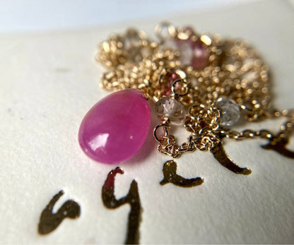 Agete Law pink and purple color stone pendant on a 38cm gold K10 necklace