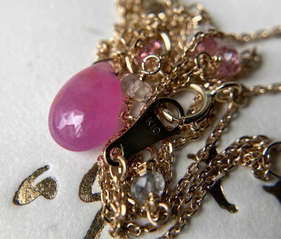 Agete Law pink and purple color stone pendant on a 38cm gold K10 necklace