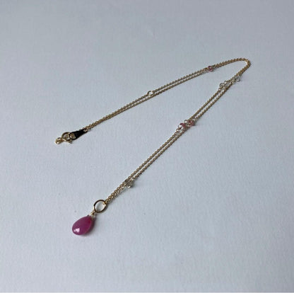 Agete Law pink and purple color stone pendant on a 38cm gold K10 necklace