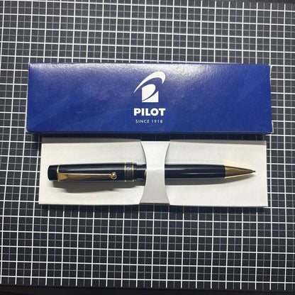 Pilot Ecrineno mechanical pencil in black and gold with box and sticker on white background