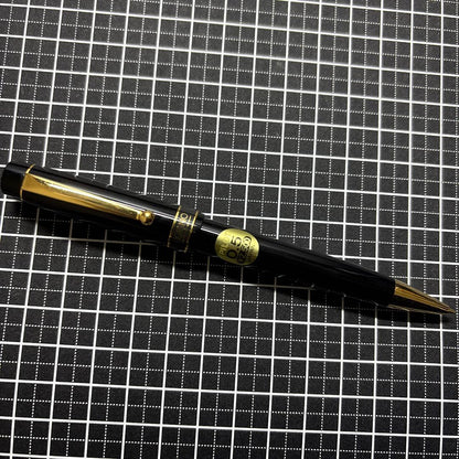 Pilot Ecrineno mechanical pencil in black and gold with box and sticker on white background