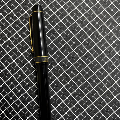 Pilot Ecrineno mechanical pencil in black and gold with box and sticker on white background