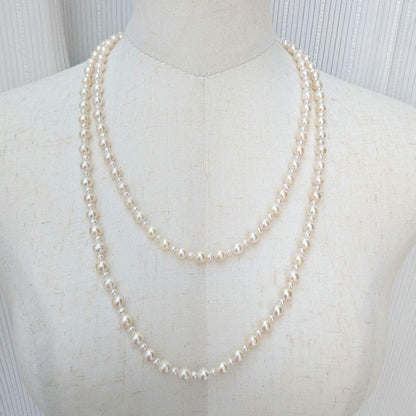 Long 120cm necklace with 6mm large Akoya pearls and 3mm small freshwater pearls on Silver925 chain