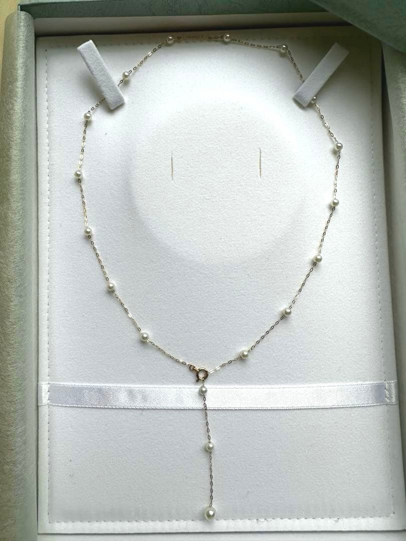 K10YG yellow gold necklace with 17 Akoya pearls ranging 3-6 mm, 45 cm length