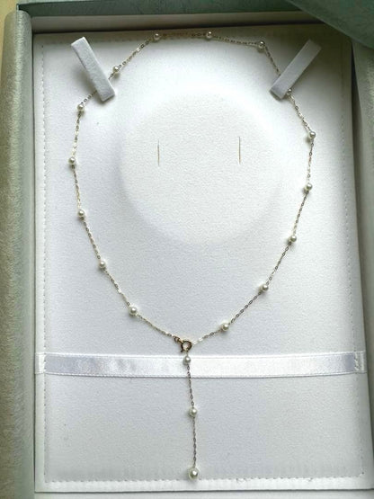K10YG yellow gold necklace with 17 Akoya pearls ranging 3-6 mm, 45 cm length