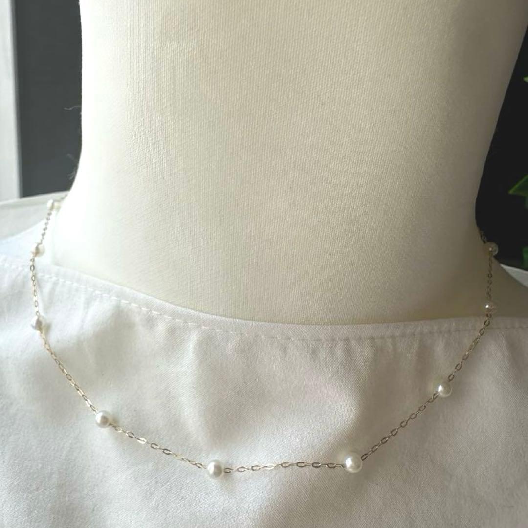 K10YG yellow gold necklace with 17 Akoya pearls ranging 3-6 mm, 45 cm length