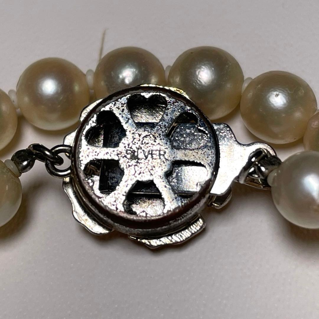 Akoya pearl necklace with round white pearls measuring 5.8-6.4mm on a 46.7cm silver chain