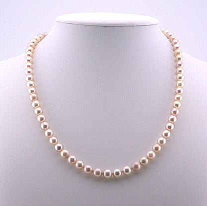 Akoya pearl necklace featuring 6.0 to 6.5mm pearls with silver clasp and safety chain on 45.5 cm strand