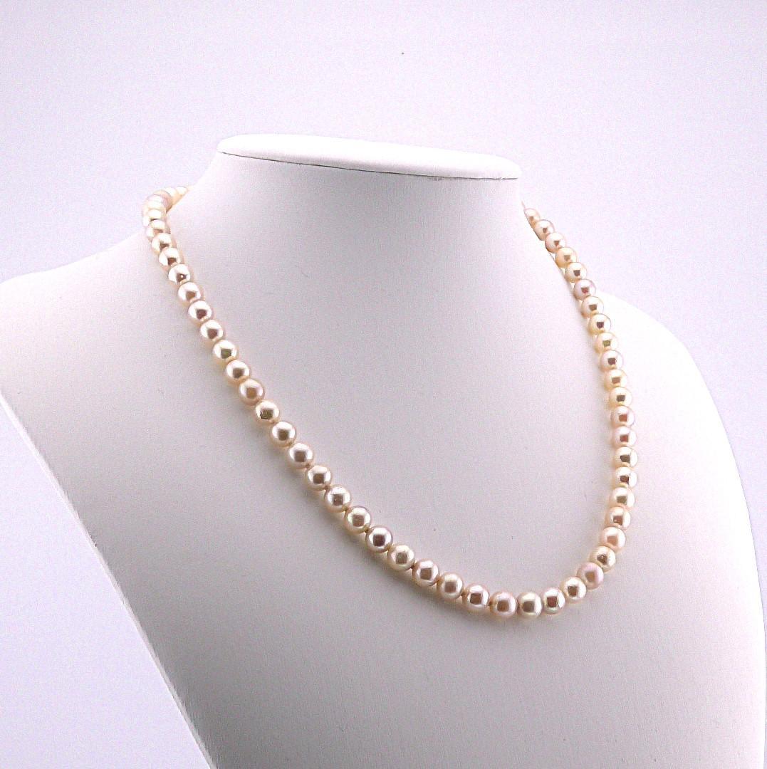Akoya pearl necklace featuring 6.0 to 6.5mm pearls with silver clasp and safety chain on 45.5 cm strand