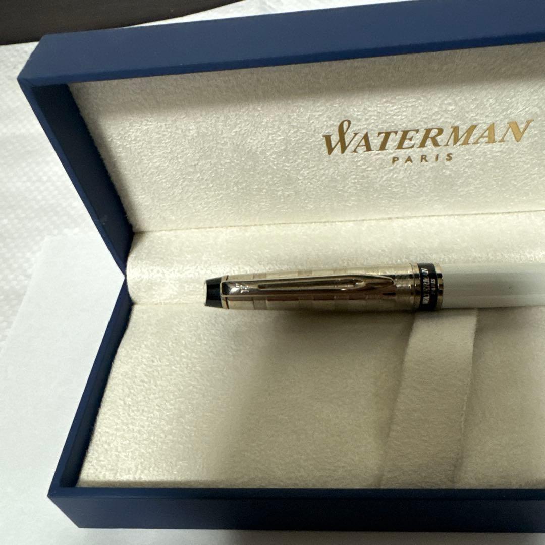 Waterman ballpoint pen in white and silver with a checkered cap and dedicated case