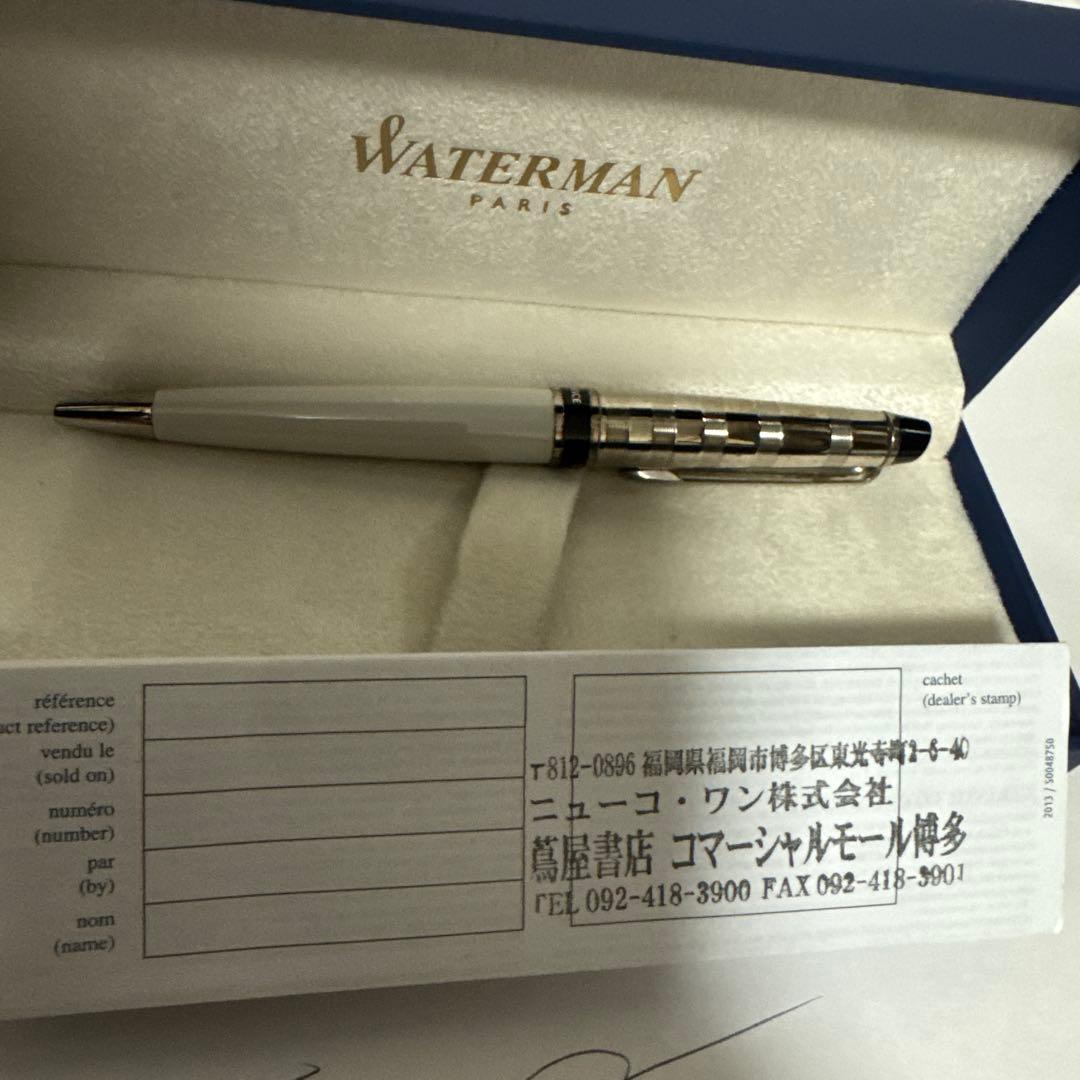 Waterman ballpoint pen in white and silver with a checkered cap and dedicated case