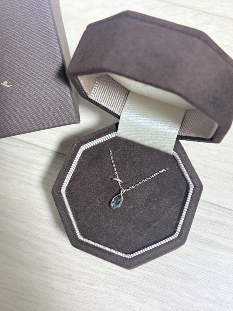 Agete silver necklace with a small blue topaz pendant 0.82 cm vertical and 0.63 cm horizontal on a 50 cm chain with box