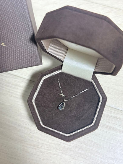 Agete silver necklace with a small blue topaz pendant 0.82 cm vertical and 0.63 cm horizontal on a 50 cm chain with box