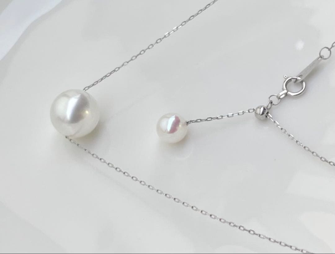 White Dream Aurora Phoenix pearl necklace featuring 10.2mm white pearl on PT900 chain with certificate