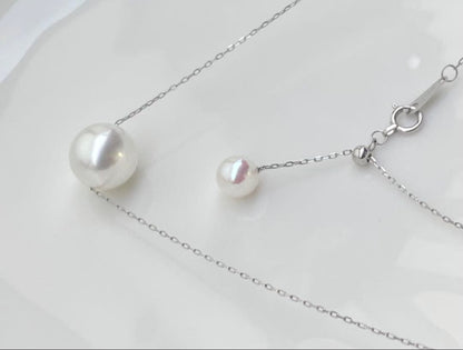 White Dream Aurora Phoenix pearl necklace featuring 10.2mm white pearl on PT900 chain with certificate
