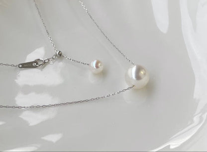White Dream Aurora Phoenix pearl necklace featuring 10.2mm white pearl on PT900 chain with certificate
