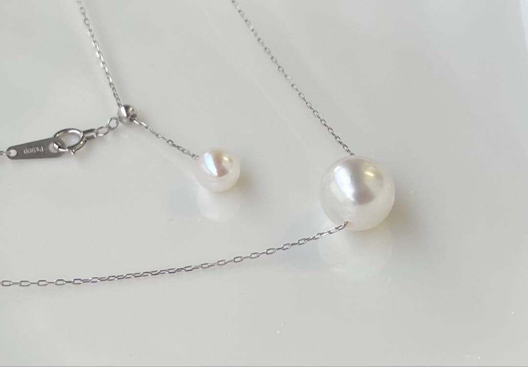 White Dream Aurora Phoenix pearl necklace featuring 10.2mm white pearl on PT900 chain with certificate