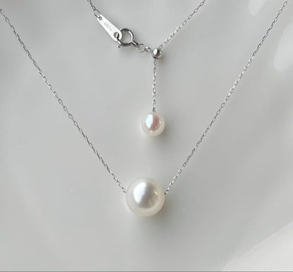 White Dream Aurora Phoenix pearl necklace featuring 10.2mm white pearl on PT900 chain with certificate