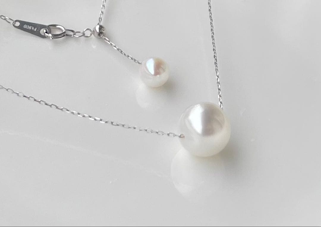 White Dream Aurora Phoenix pearl necklace featuring 10.2mm white pearl on PT900 chain with certificate