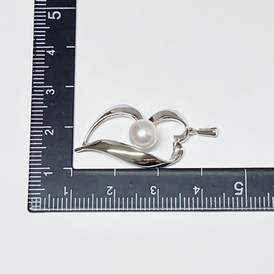 MIKIMOTO genuine pearl necklace featuring 6.7mm pearls on a silver chain weighing 2.3 grams