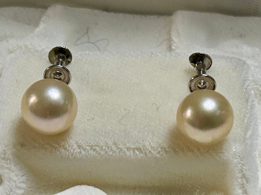 Akoya pearl necklace 8-8.5mm with K14WG earring set and silver single earring displayed on white background