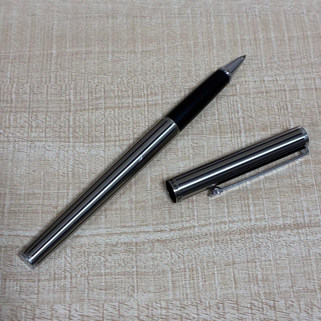 Pilot ballpoint pen with silver stripe design and included protective case and manual