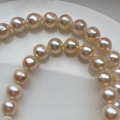 Honolulu Pearl Akoya pearl necklace with 54 toned champagne pearls, 6.8-7.5mm size, 43cm length, silver clasp