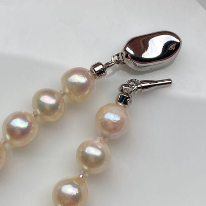 Honolulu Pearl Akoya pearl necklace with 54 toned champagne pearls, 6.8-7.5mm size, 43cm length, silver clasp