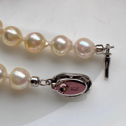 Honolulu Pearl Akoya pearl necklace with 54 toned champagne pearls, 6.8-7.5mm size, 43cm length, silver clasp