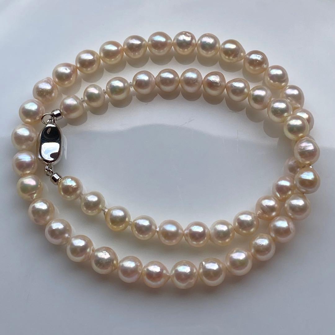 Honolulu Pearl Akoya pearl necklace with 54 toned champagne pearls, 6.8-7.5mm size, 43cm length, silver clasp