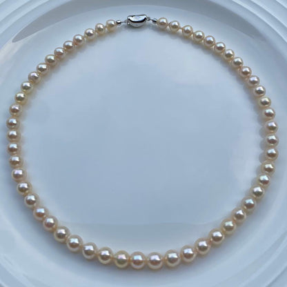 Honolulu Pearl Akoya pearl necklace with 54 toned champagne pearls, 6.8-7.5mm size, 43cm length, silver clasp