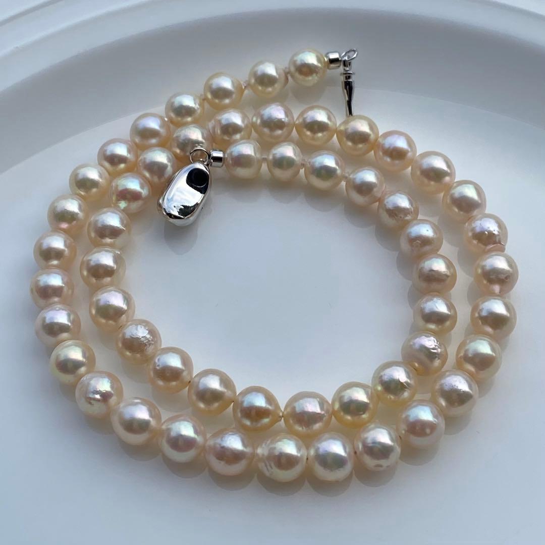 Honolulu Pearl Akoya pearl necklace with 54 toned champagne pearls, 6.8-7.5mm size, 43cm length, silver clasp