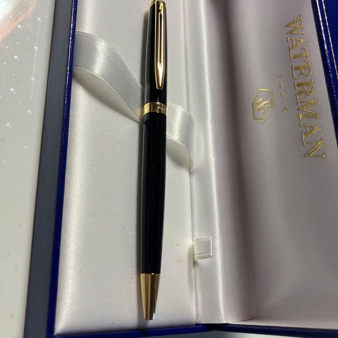 WATERMAN black and gold ballpoint pen with dedicated black case on white background