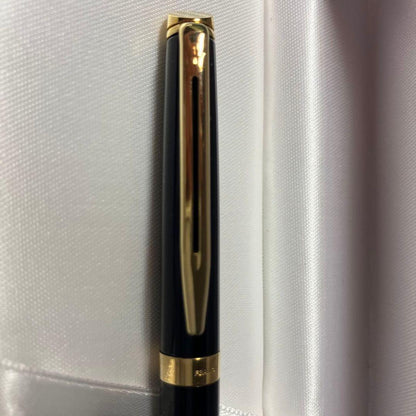 WATERMAN black and gold ballpoint pen with dedicated black case on white background