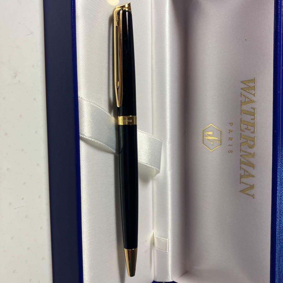 WATERMAN black and gold ballpoint pen with dedicated black case on white background