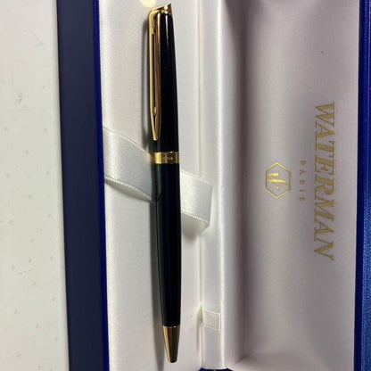 WATERMAN black and gold ballpoint pen with dedicated black case on white background