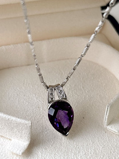 Tasaki amethyst purple gemstone diamond pendant top in white gold metal weighing 3.9 grams