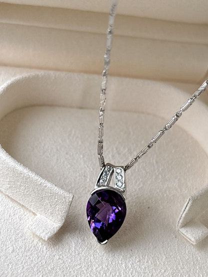 Tasaki amethyst purple gemstone diamond pendant top in white gold metal weighing 3.9 grams