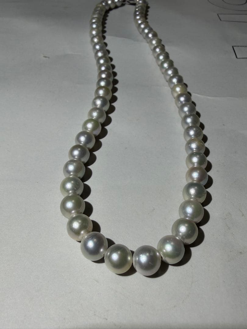 Akoya seawater pearl necklace with 7.5mm blue-gray pearls and silver color clasp