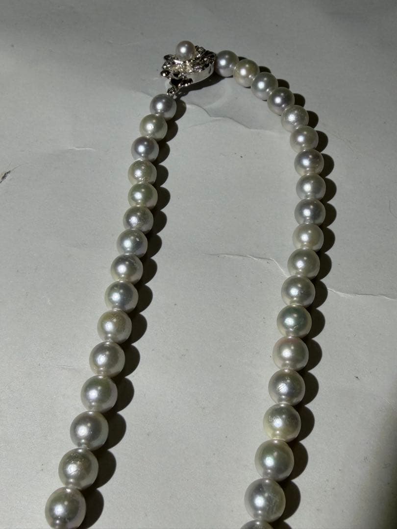 Akoya seawater pearl necklace with 7.5mm blue-gray pearls and silver color clasp