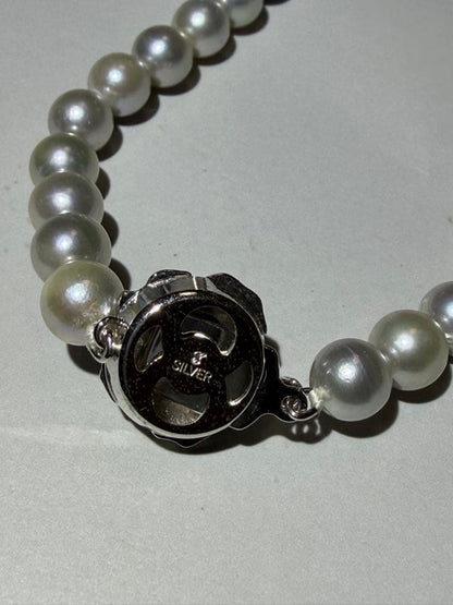 Akoya seawater pearl necklace with 7.5mm blue-gray pearls and silver color clasp